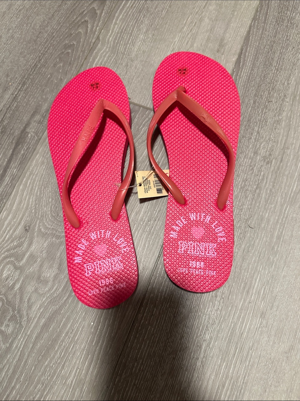 PINK Victoria's Secret Hot Pink Textured Flip Flops new with tags size M (7/8)